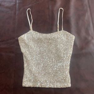 Sparkly tank top with cover layer underneath (no bras required)
